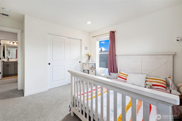 12605 179th St E, Puyallup, WA 98374 - carpeted bedroom featuring a closet, baseboards, and recessed lighting