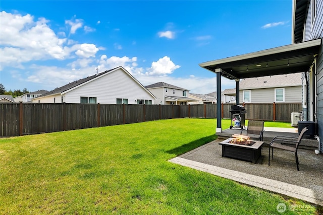 12605 179th St E, Puyallup, WA 98374 - view of yard featuring an outdoor fire pit and a patio area