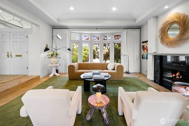 3727 W Barrett St, Seattle, WA 98199 - living room featuring a raised ceiling, baseboards, a premium fireplace, and recessed lighting