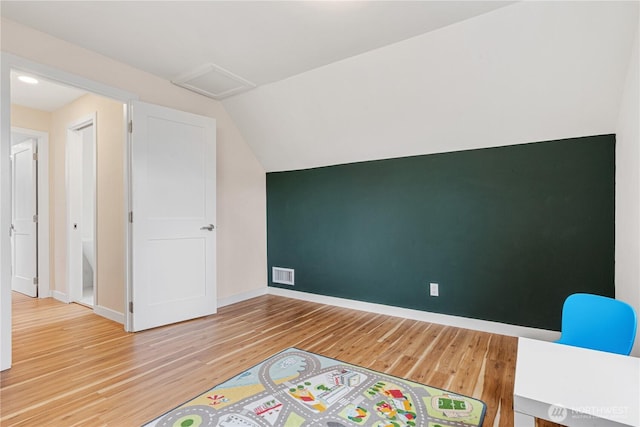 6026 35th Ave NE, Seattle, WA 98115 - additional living space with attic access, wood finished floors, baseboards, and lofted ceiling