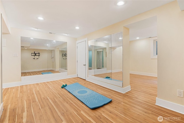 6026 35th Ave NE, Seattle, WA 98115 - exercise room with baseboards, wood finished floors, and recessed lighting