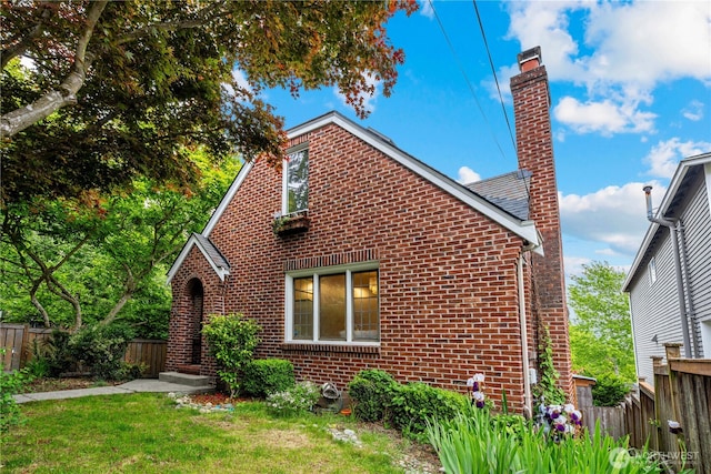 6026 35th Ave NE, Seattle, WA 98115 - view of front of home with brick siding and a chimney