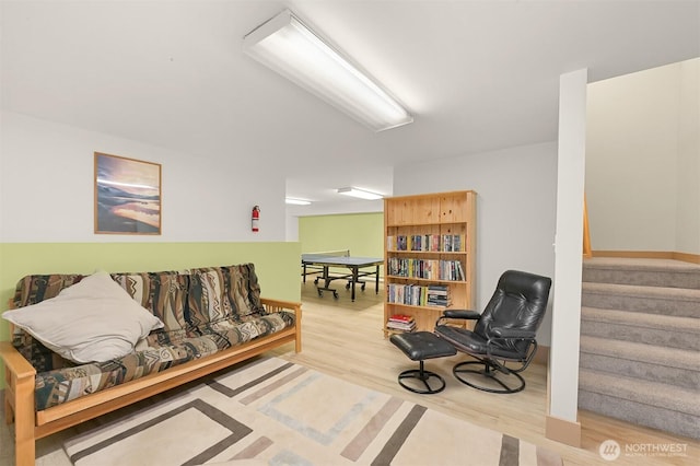 7117 Rainier Way, Deming, WA 98244 - sitting room featuring wood finished floors and stairway
