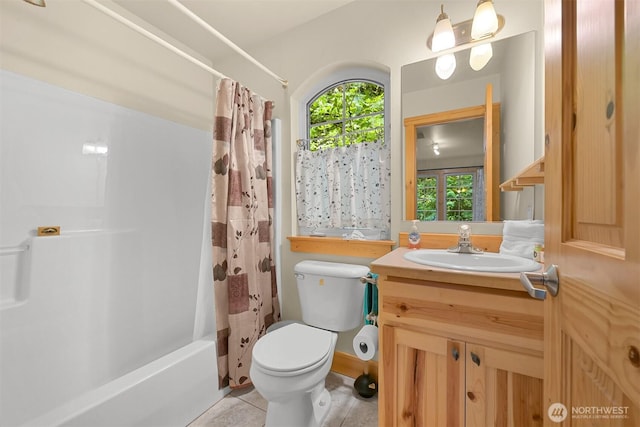 7117 Rainier Way, Deming, WA 98244 - bathroom with vanity, toilet, shower / tub combo with curtain, and tile patterned floors