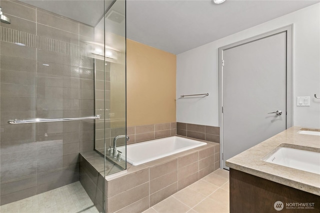 full bath featuring a shower stall, a bath, tile patterned floors, and double vanity