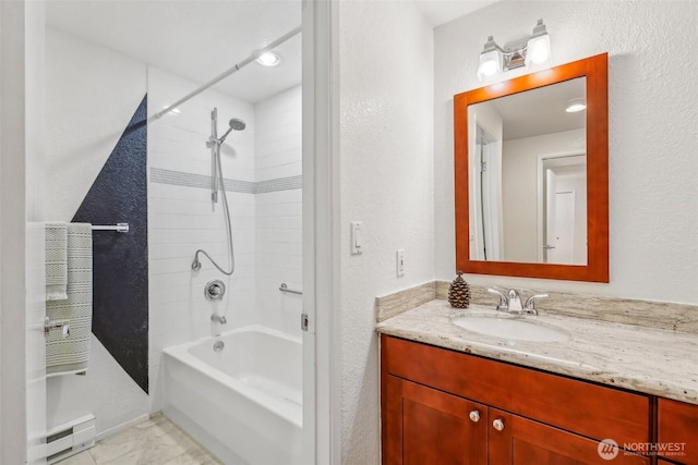 132 N 132nd Unit 202, Seattle, WA 98133 - full bath featuring vanity, a baseboard heating unit, washtub / shower combination, a textured wall, and tile patterned flooring