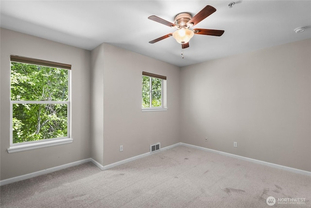 33020 10th Ave SW Unit Y304, Federal Way, WA 98023 - empty room featuring a smoke detector, baseboards, a ceiling fan, and carpet floors