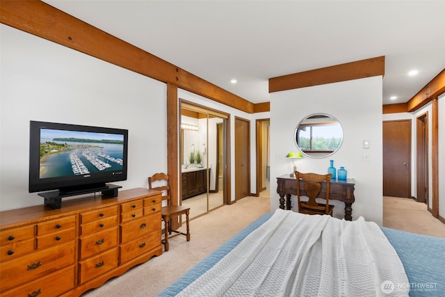 131 N Bay Ln Unit 4, Port Ludlow, WA 98365 - bedroom featuring light colored carpet, recessed lighting, and ensuite bath