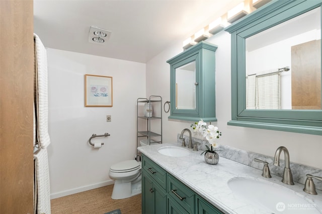 131 N Bay Ln Unit 4, Port Ludlow, WA 98365 - full bathroom featuring double vanity and toilet