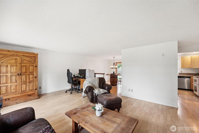 3512 Frances Dr SE, Lacey, WA 98503 - living area featuring light wood-style flooring, a chandelier, and an office area
