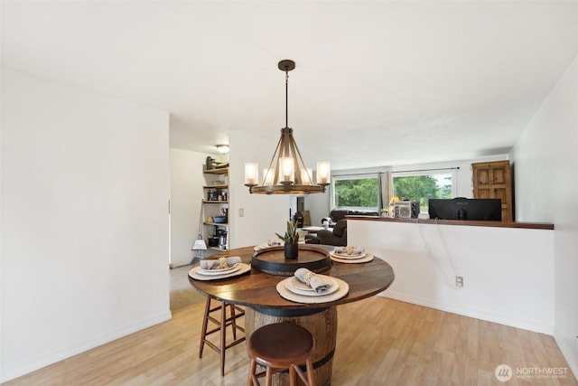 3512 Frances Dr SE, Lacey, WA 98503 - dining space with a chandelier and light wood-style floors
