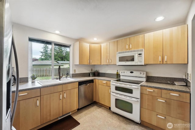 3512 Frances Dr SE, Lacey, WA 98503 - kitchen featuring appliances with stainless steel finishes, a sink, light brown cabinets, dark countertops, and recessed lighting