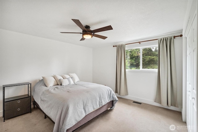 3512 Frances Dr SE, Lacey, WA 98503 - bedroom featuring light carpet, a ceiling fan, and baseboards