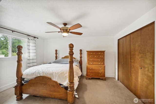 3512 Frances Dr SE, Lacey, WA 98503 - bedroom with light carpet, a closet, ceiling fan, and baseboards