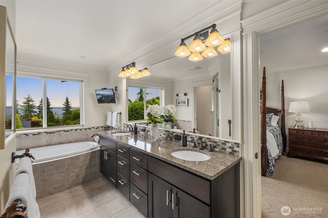 2512 Taylor Dr, Everett, WA 98203 - full bath featuring ensuite bathroom, double vanity, a garden tub, tile patterned floors, and crown molding