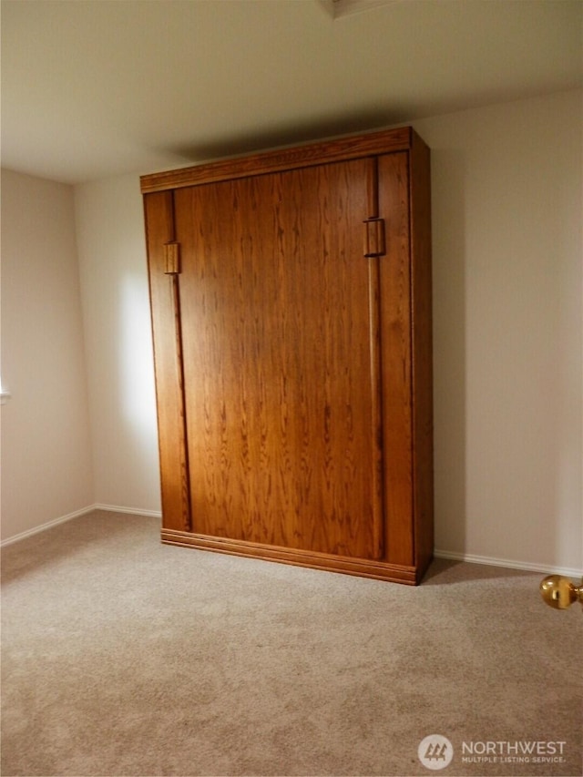 7819 Amethyst Loop NW, Silverdale, WA 98383 - carpeted empty room with baseboards