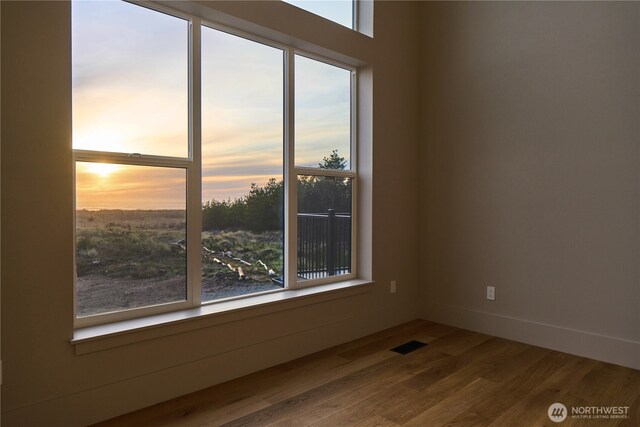 27208 J Ln, Ocean Park, WA 98640 - spare room featuring healthy amount of natural light, wood finished floors, and baseboards