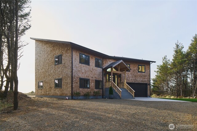 27208 J Ln, Ocean Park, WA 98640 - view of front of home featuring concrete driveway and a garage