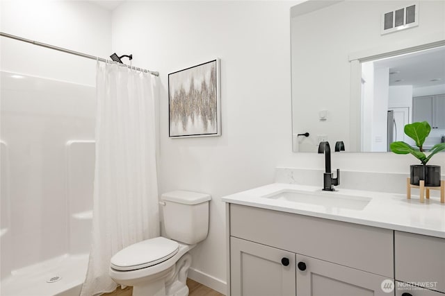 2818 Hazelwood Dr, Blaine, WA 98230 - full bathroom featuring vanity, toilet, and a shower with curtain