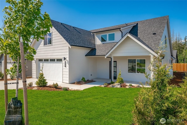 2818 Hazelwood Dr, Blaine, WA 98230 - view of front of house with a shingled roof, a front lawn, and a porch