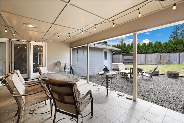505 Cougar St SE, Lacey, WA 98503 - view of patio / terrace with a fire pit