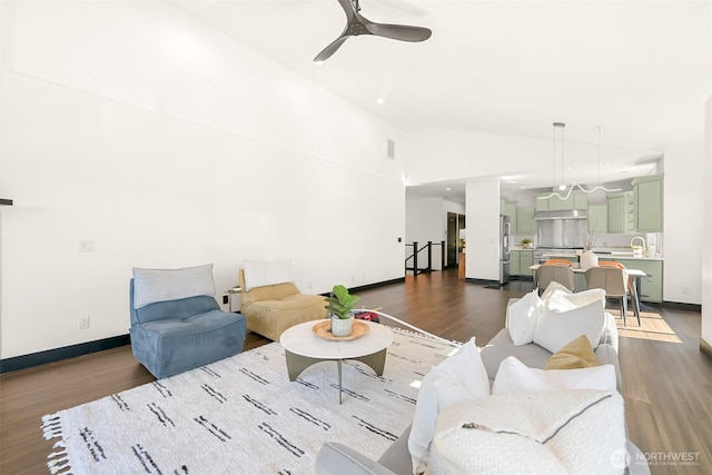 5496 Grandview Rd, Blaine, WA 98230 - living room with vaulted ceiling, dark wood-style floors, baseboards, and a ceiling fan