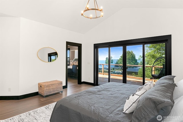 5496 Grandview Rd, Blaine, WA 98230 - bedroom with access to outside, a chandelier, wood finished floors, high vaulted ceiling, and baseboards