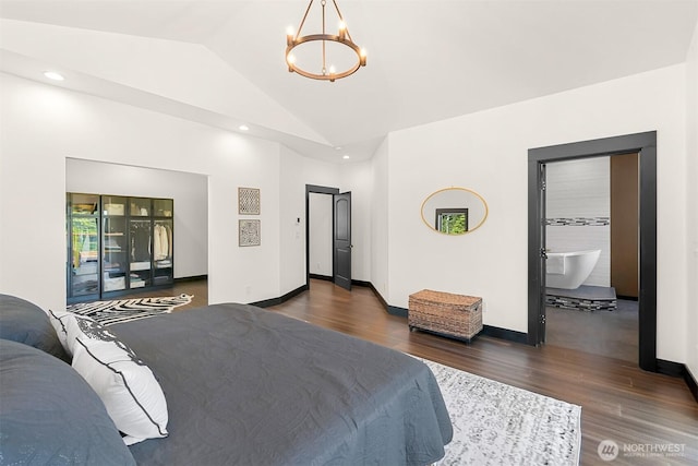 5496 Grandview Rd, Blaine, WA 98230 - bedroom with a chandelier, wood finished floors, lofted ceiling, baseboards, and recessed lighting