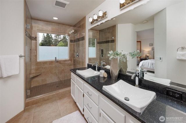11423 NE 104th St, Kirkland, WA 98033 - ensuite bathroom with double vanity, a shower stall, and tile patterned floors