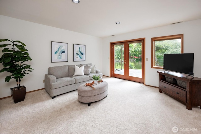11423 NE 104th St, Kirkland, WA 98033 - living area featuring light carpet, baseboards, and recessed lighting