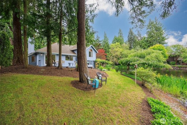 11423 NE 104th St, Kirkland, WA 98033 - view of grassy yard featuring a water view