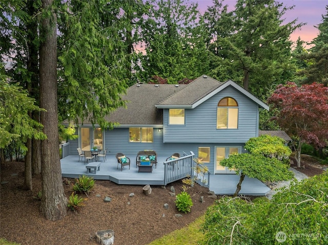 11423 NE 104th St, Kirkland, WA 98033 - rear view of house with a wooden deck and a shingled roof
