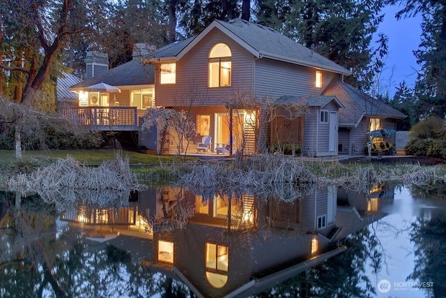 11423 NE 104th St, Kirkland, WA 98033 - rear view of property with roof with shingles