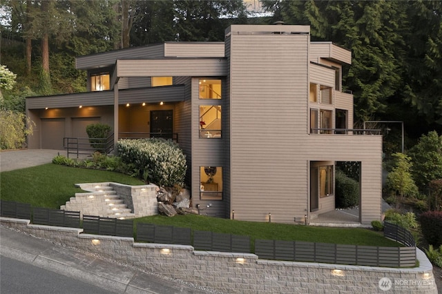 13707 SE 51st Pl, Bellevue, WA 98006 - contemporary house with concrete driveway, a balcony, a garage, and a front yard