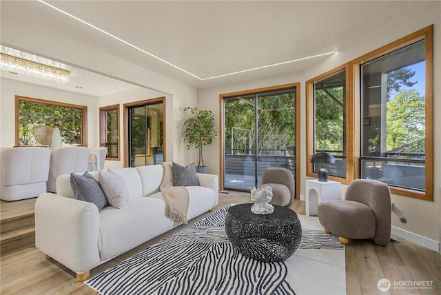 13707 SE 51st Pl, Bellevue, WA 98006 - living room with light wood-style floors and baseboards