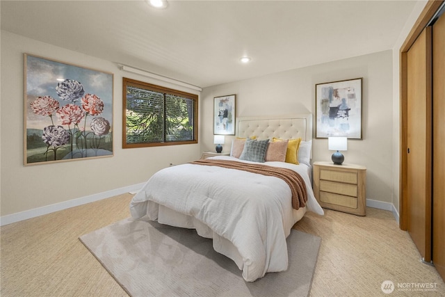 13707 SE 51st Pl, Bellevue, WA 98006 - bedroom featuring recessed lighting, a closet, baseboards, and light colored carpet