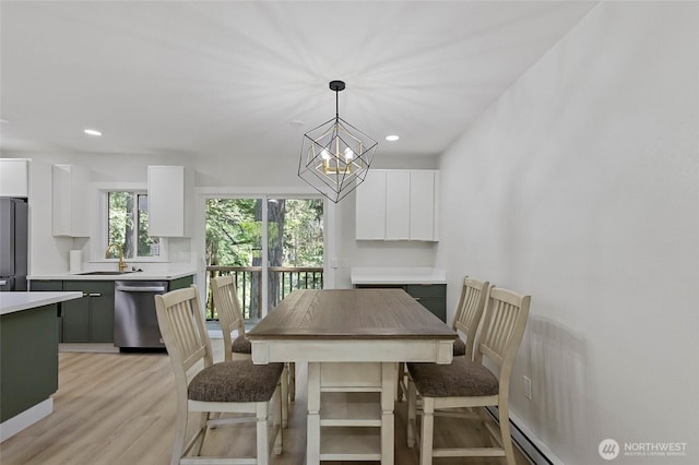 50 Lake Louise Dr, Bellingham, WA 98229 - dining area featuring recessed lighting, a chandelier, and light wood finished floors