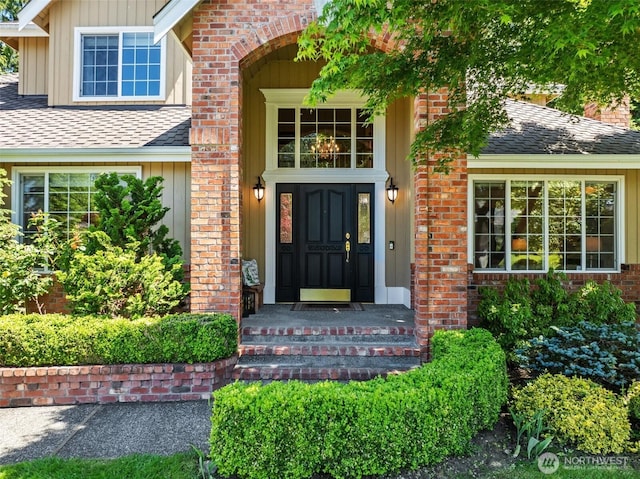 3924 Montgomery Ct, Mount Vernon, WA 98274 - entrance to property with roof with shingles and brick siding
