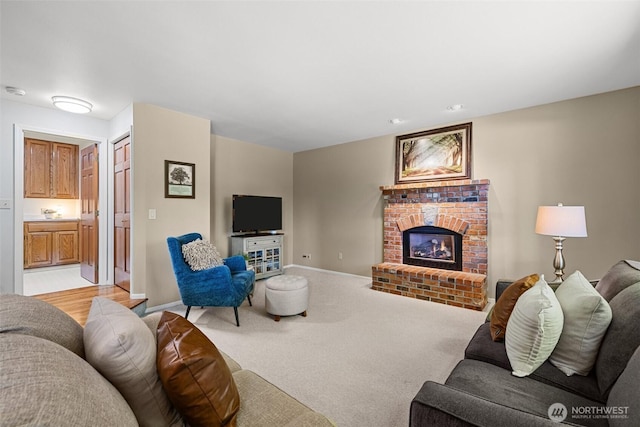3924 Montgomery Ct, Mount Vernon, WA 98274 - living room featuring baseboards, a fireplace, and light colored carpet