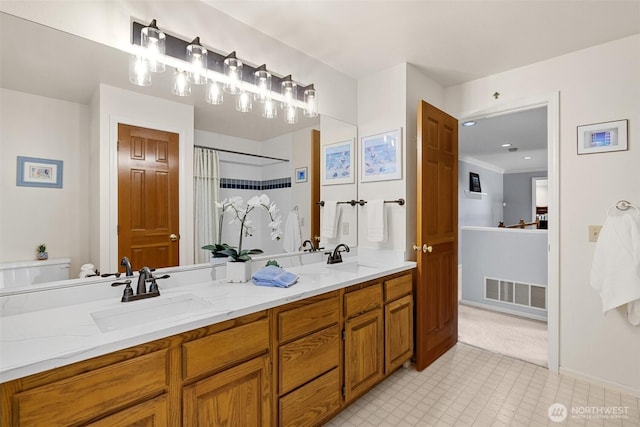 3924 Montgomery Ct, Mount Vernon, WA 98274 - bathroom with toilet, double vanity, a shower with curtain, and baseboards