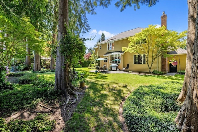 3924 Montgomery Ct, Mount Vernon, WA 98274 - view of grassy yard with a patio area