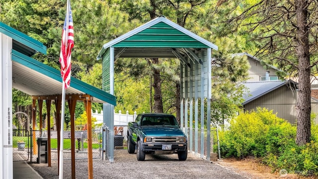 1811 Hundley Rd, Cle Elum, WA 98922 - view of parking featuring fence, a carport, and driveway