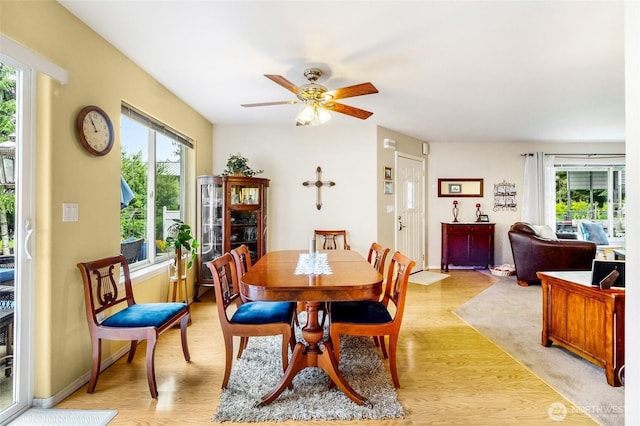1811 Hundley Rd, Cle Elum, WA 98922 - dining area with plenty of natural light, ceiling fan, light wood-style flooring, and baseboards