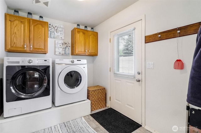 1811 Hundley Rd, Cle Elum, WA 98922 - washroom with cabinet space, separate washer and dryer, and light tile patterned flooring