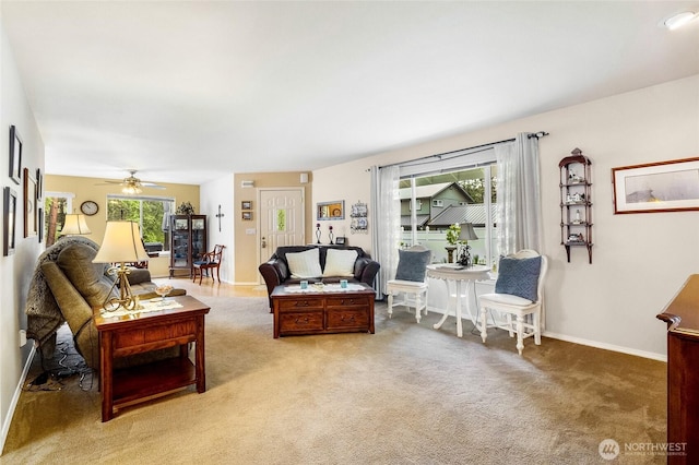 1811 Hundley Rd, Cle Elum, WA 98922 - living room with light colored carpet, a ceiling fan, and baseboards