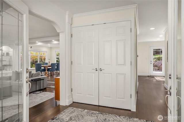 9209 SE 57th St, Mercer Island, WA 98040 - entrance foyer featuring ornamental molding, arched walkways, dark wood-type flooring, recessed lighting, and baseboards