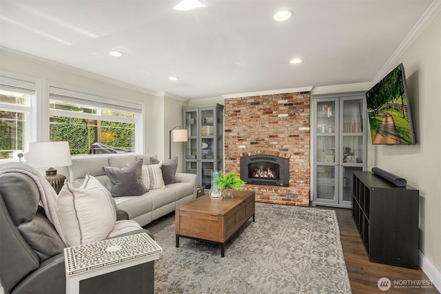 9209 SE 57th St, Mercer Island, WA 98040 - living area featuring wood finished floors, a brick fireplace, crown molding, recessed lighting, and baseboards