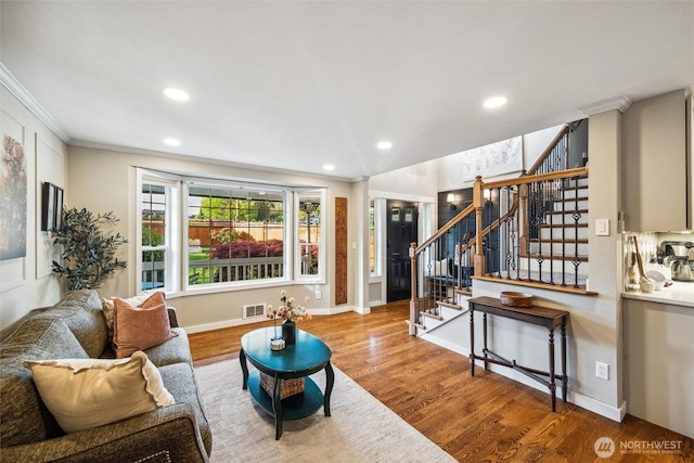 4279 H Street Rd, Blaine, WA 98230 - living room with crown molding, wood finished floors, stairway, recessed lighting, and baseboards