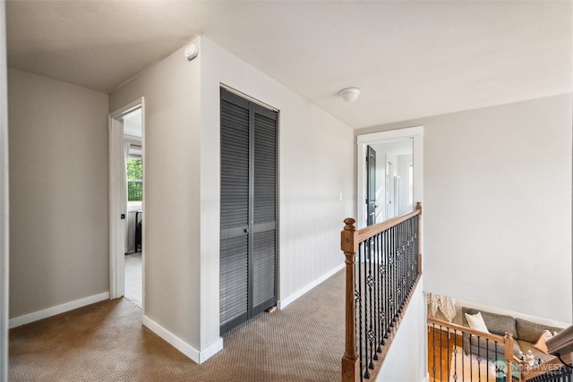 4279 H Street Rd, Blaine, WA 98230 - corridor with an upstairs landing, carpet floors, and baseboards