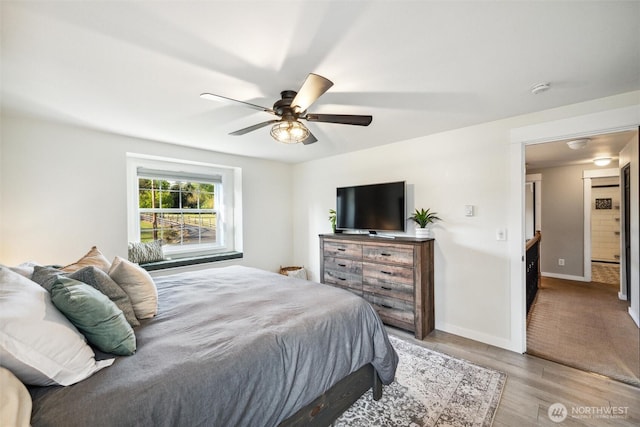4279 H Street Rd, Blaine, WA 98230 - bedroom featuring wood finished floors, baseboards, and ceiling fan